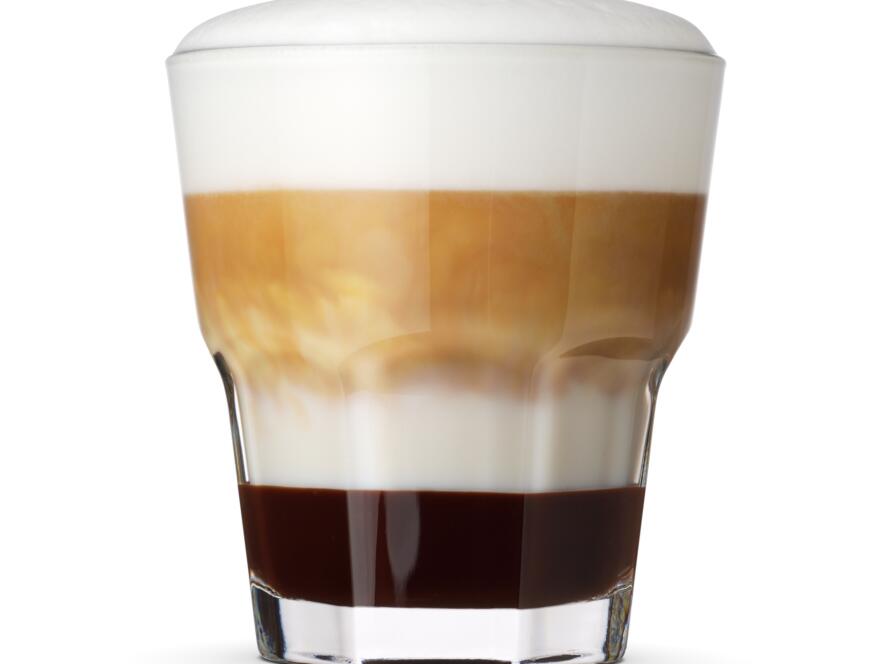 Glass of layered coffee mocha isolated on white.
